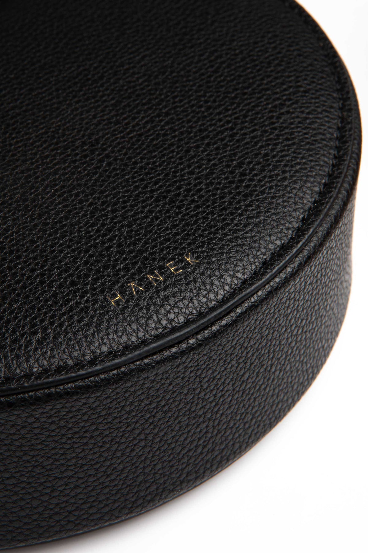 Schwarze runde Tasche